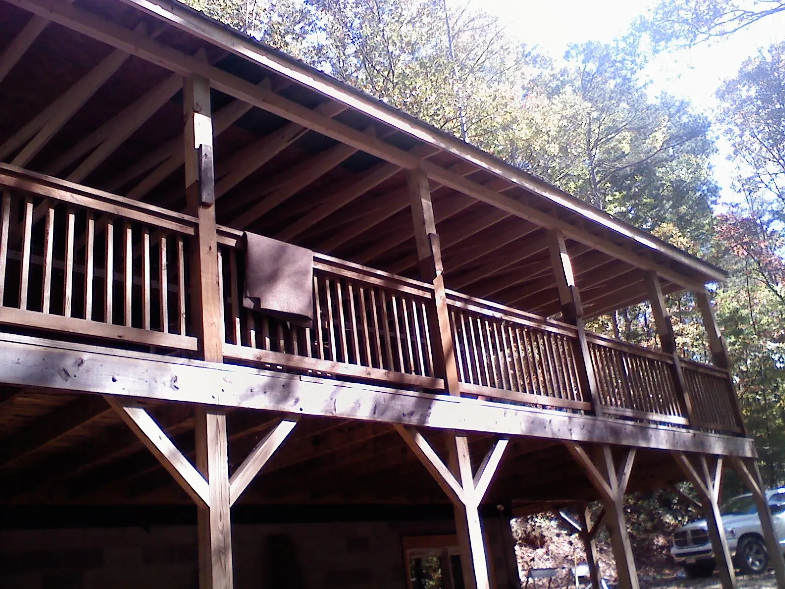 Timber framing under a new elevated porch and deck — Roof Leak Repair in Pennsylvania Furnace by Roofing Brothers